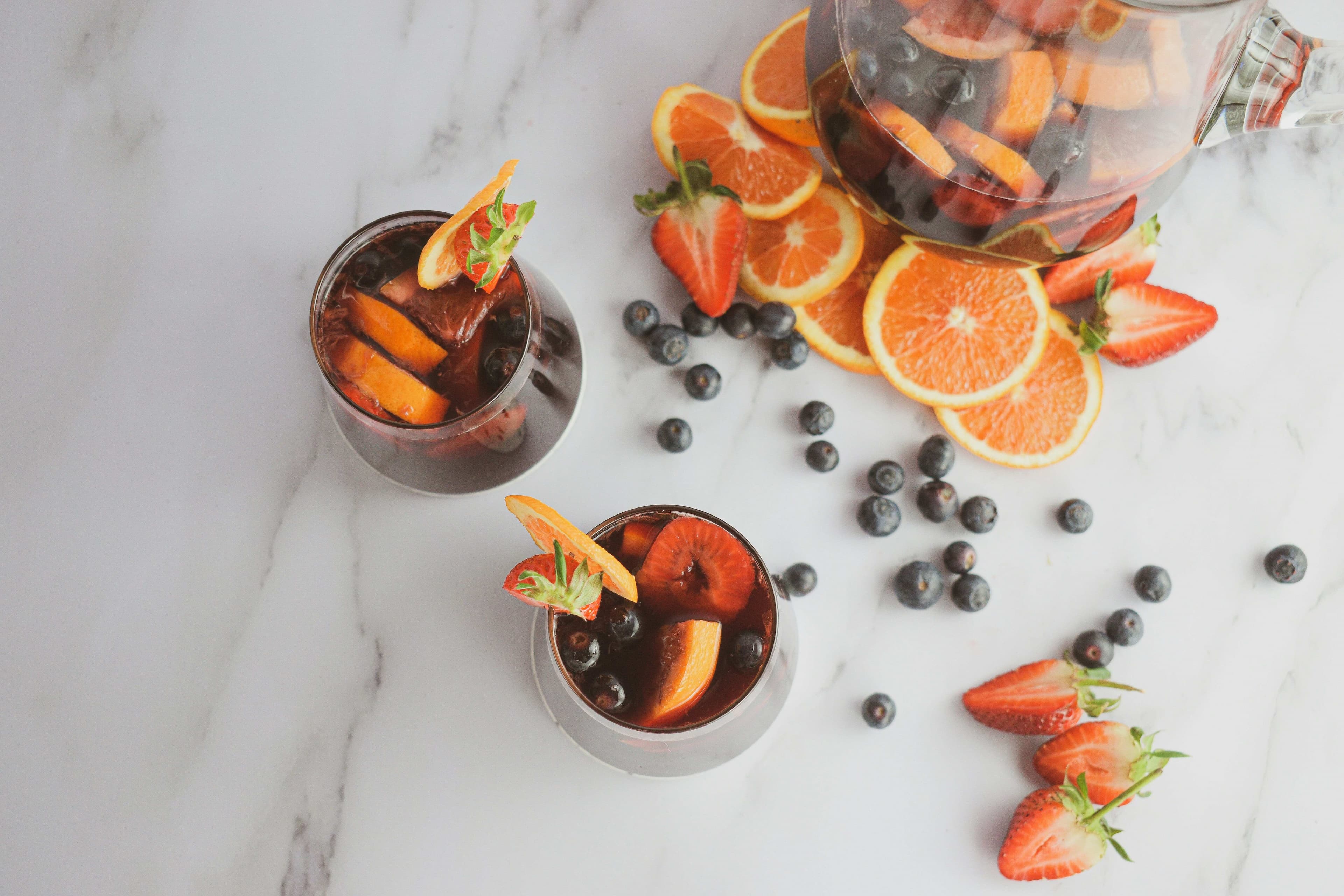 On The Art Of Sangria Presentation: Garnishes, Glassware And Style 