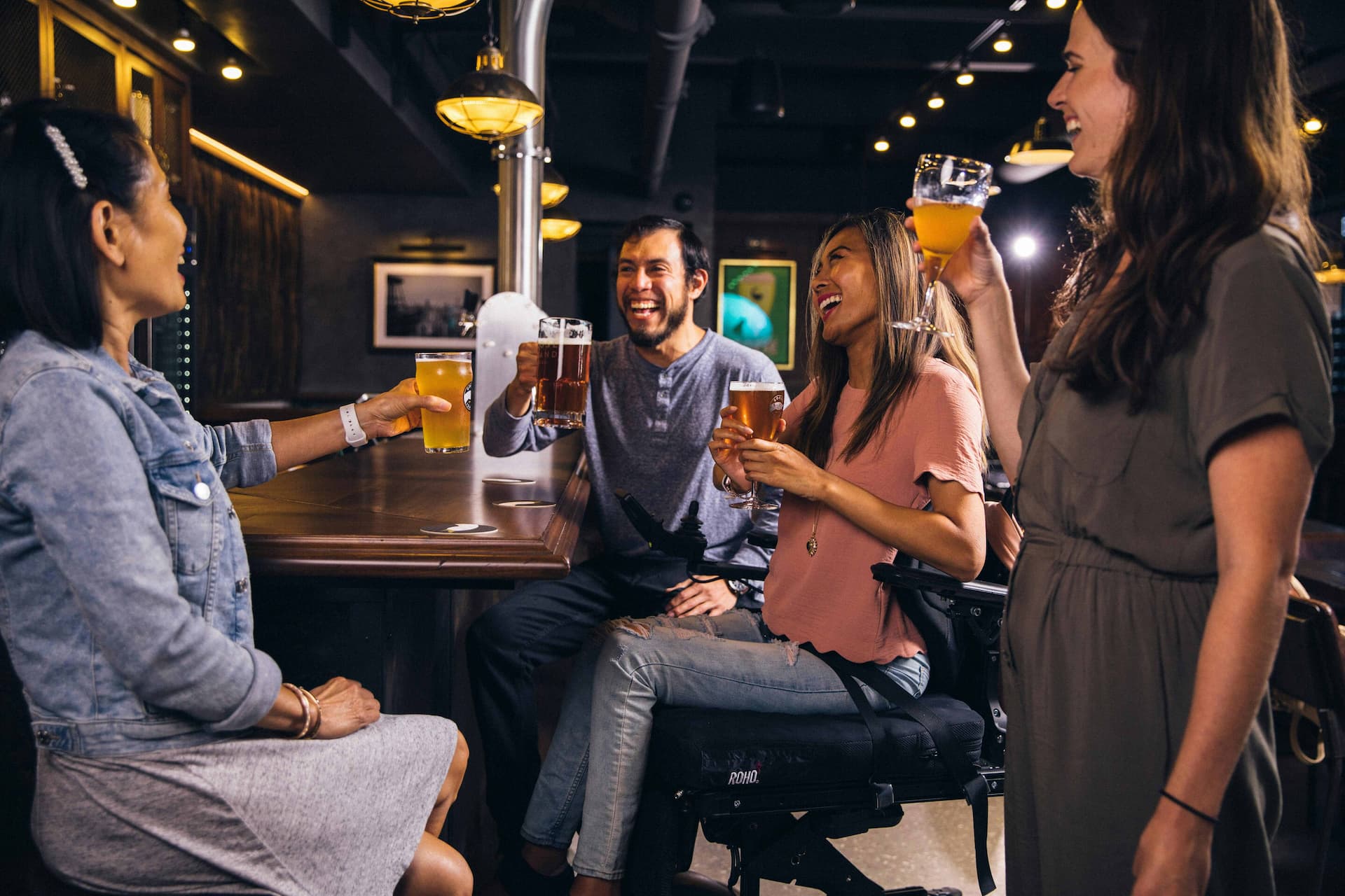 People drinking at a bar.