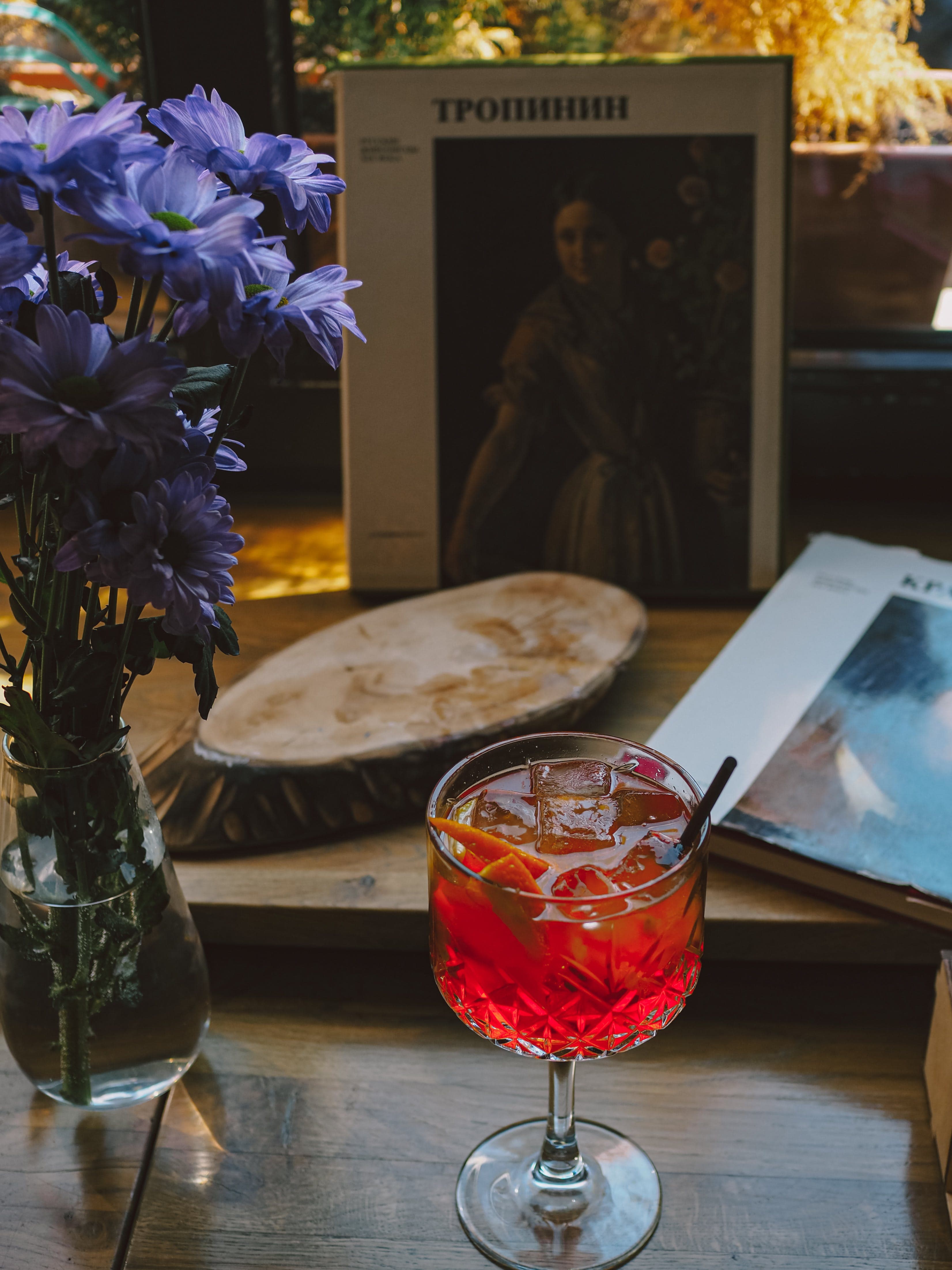 red cocktail with book 