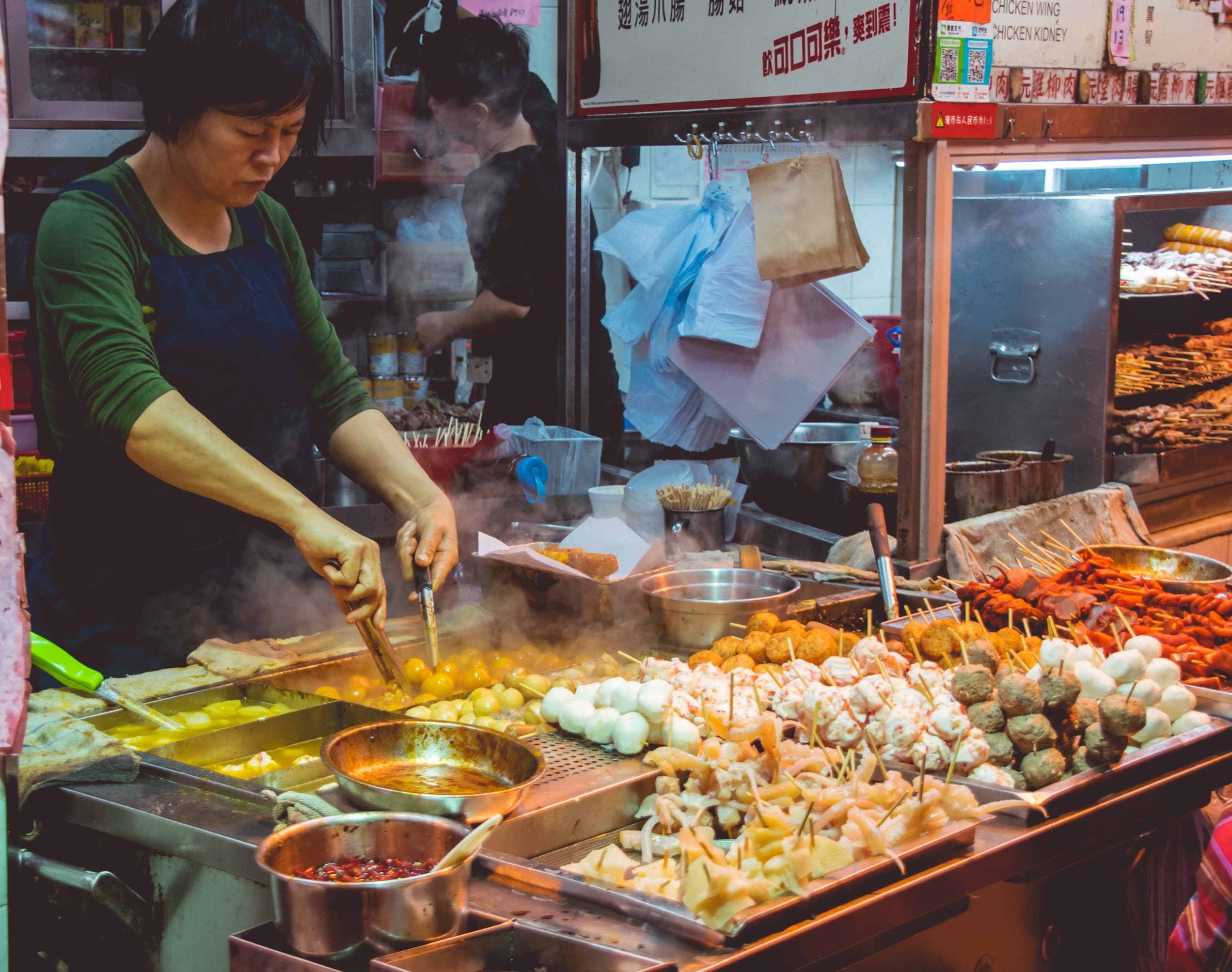 A scene from a street food market in Hong Kong. 